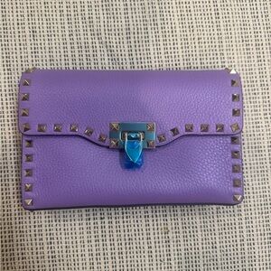 Beautiful Valentino clutch / crossbody in a unique tone of deep purple.